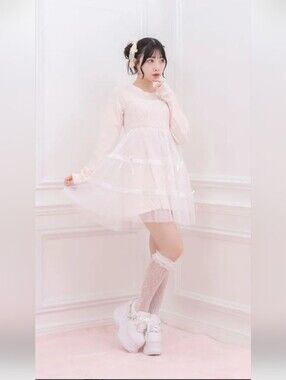 Honey cinnamon longsleeve babydoll dress with bows and tulle skirt